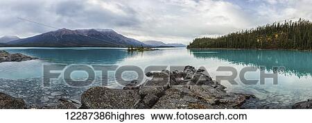 Stock Photograph - Panoramic view of Atlin Lake; British Columbia, Canada. Fotosearch