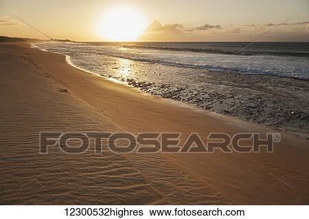 Stock Photograph - Papohaku Beach Park at sunset; Molokai, Hawaii, United States of America. Fotosearch
