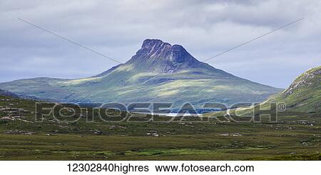 Peak of a mountain under a cloudy sky in the Highlands; Scotland View Large Photo Image Stock Photograph - Peak of a mountain under a cloudy sky in the Highlands; Scotland. Fotosearch