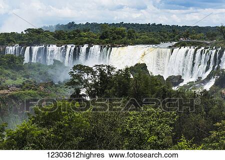 People on observation deck watching Iguazu Falls; Parana, Brazil View Large Photo Image Stock Photograph - People on observation deck watching Iguazu Falls; Parana, Brazil. Fotosearch