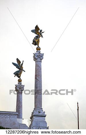 Stock Photograph - Pillars with angel sculptures; Rome, Italy. Fotosearch