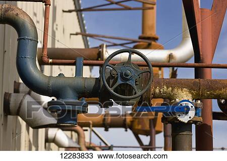 Pipe vents and valves on the exterior of a electrical power plant, Sand Point, Southwestern Alaska, USA, Summer View Large Photo Image Stock Image - Pipe vents and valves on the exterior of a electrical power plant, Sand Point, Southwestern Alaska, USA, Summer. Fotosearch