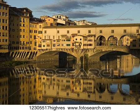Stock Photograph - Ponte Vecchio and Arno River; Florence, Toscana, Italy. Fotosearch