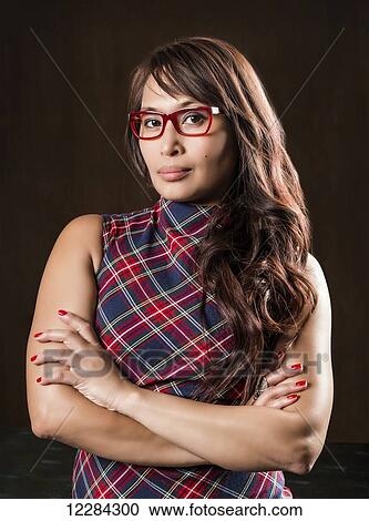 Stock Image - Portrait of a professional business woman of Filipino ethnicity; St. Albert, Alberta, Canada. Fotosearch