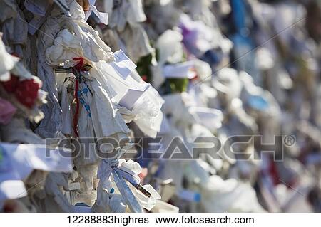 Stock Photograph - Prayer cloths on a wall; Ephesus, Turkey. Fotosearch