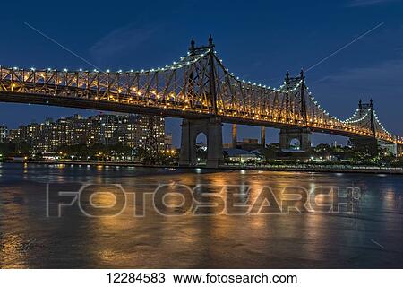 Stock Image - Queensboro (59th Street) Bridge at twilight; Queens, New York, United States of America. Fotosearch