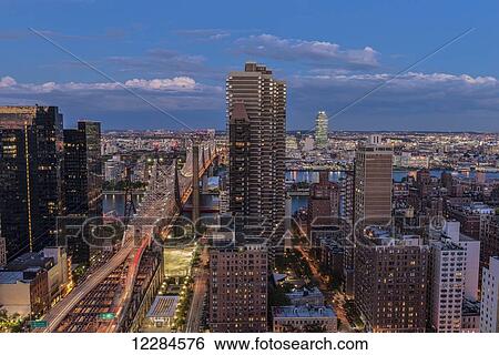 Queensboro (59th Street) Bridge at twilight; New York City, New York, United States of America View Large Photo Image Stock Photograph - Queensboro (59th Street) Bridge at twilight; New York City, New York, United States of America. Fotosearch