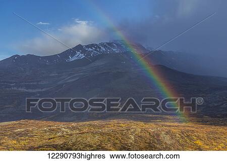 Rainbow over autumn colored tundra along the Haines Highway, British Columbia, Canada View Large Photo Image Stock Photograph - Rainbow over autumn colored tundra along the Haines Highway, British Columbia, Canada. Fotosearch