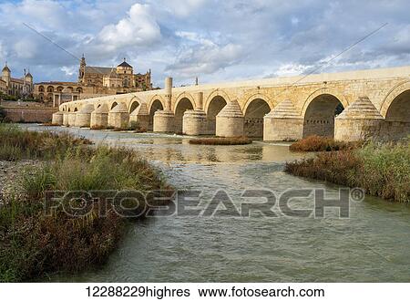 Stock Photograph - Roman bridge of Cordoba; Cordoba, Andalusia, Spain. Fotosearch