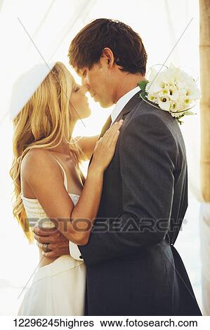 Stock Photograph - Romantic Beautiful Wedding Couple. Fotosearch