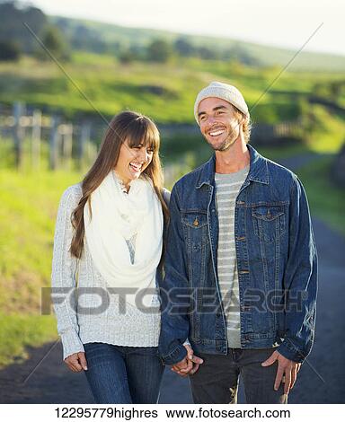 Romantic Young Couple in Love Outdoors on Country Road View Large Photo Image Stock Photograph - Romantic Young Couple in Love Outdoors on Country Road. Fotosearch