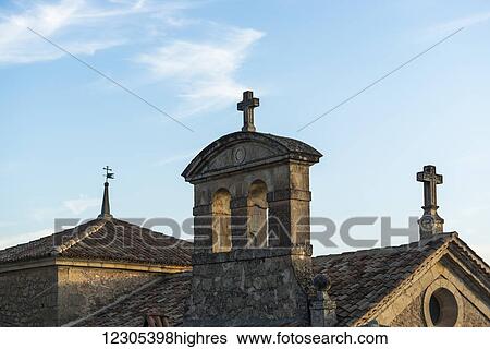 Stock Photograph - Rooftop of a church in downtown Cuenca; Cuenca, Castile-La Mancha, Spain. Fotosearch