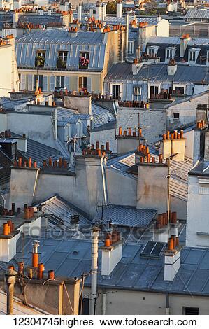 Rooftops of residential buildings; Paris, France View Large Photo Image Stock Photograph - Rooftops of residential buildings; Paris, France. Fotosearch