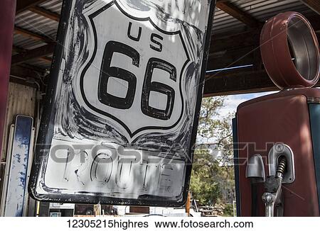 Route 66 sign and old gas pump; Seligman, Arizona, United States of America View Large Photo Image Stock Photograph - Route 66 sign and old gas pump; Seligman, Arizona, United States of America. Fotosearch