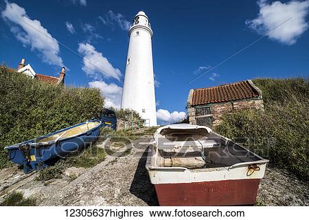 Rowboats on the shore at the base of St. Mary's Lighthouse on St. Mary's Island; Whitley Bay, Tyne and Wear, England View Large Photo Image Stock Photograph - Rowboats on the shore at the base of St. Mary's Lighthouse on St. Mary's Island; Whitley Bay, Tyne and Wear, England. Fotosearch