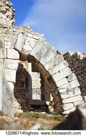 Stock Photograph - Ruined stone walls and arches; Philippi, Greece. Fotosearch