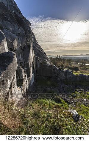 Stock Photograph - Ruins at a rock cliff; Philippi, Greece. Fotosearch