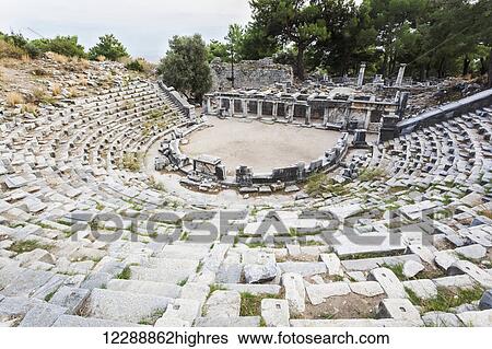 Stock Photograph - Ruins of an amphitheatre; Priene, Turkey. Fotosearch