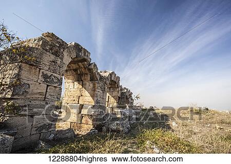 Stock Photograph - Ruins of ancient Laodicea, arches that were part of the gymnasium/bathhouse; Laodicea, Turkey. Fotosearch