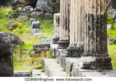 Stock Photograph - Ruins of columns; Delphi, Greece. Fotosearch