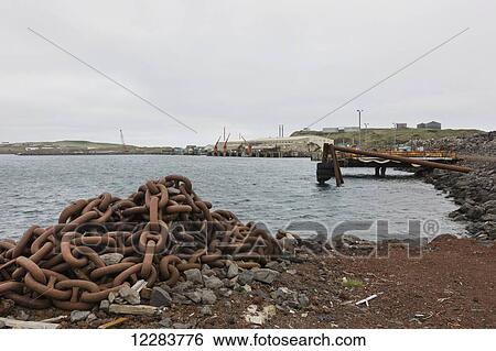 Rusted chain piled up on the shores of St. Paul Harbor, St. Paul Island, Southwestern Alaska, USA, Summer View Large Photo Image Stock Photograph - Rusted chain piled up on the shores of St. Paul Harbor, St. Paul Island, Southwestern Alaska, USA, Summer. Fotosearch