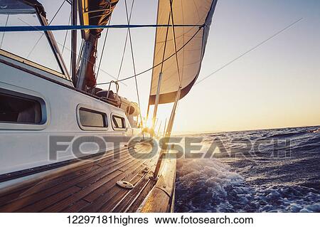 Sailing into the Sunset View Large Photo Image Stock Photograph - Sailing into the Sunset. Fotosearch