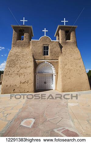 Stock Photograph - San Francisco de Asis Mission Church, National Historic Landmark, established in 1772; Ranchos de Taos, New Mexico, United States of America. Fotosearch