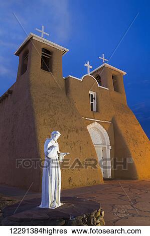 Stock Photograph - San Francisco de Asis Mission Church, National Historic Landmark, established in 1772; Ranchos de Taos, New Mexico, United States of America. Fotosearch