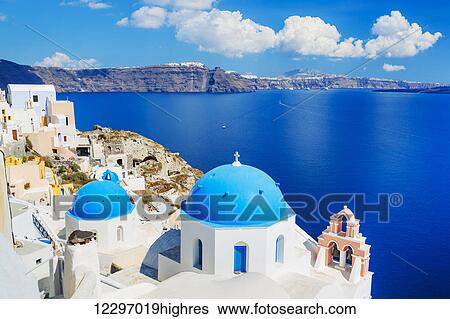 Stock Photograph - Santorini Island, Greece, Beautiful View of Blue Ocean and Traditional Dome Church Architecture. Fotosearch
