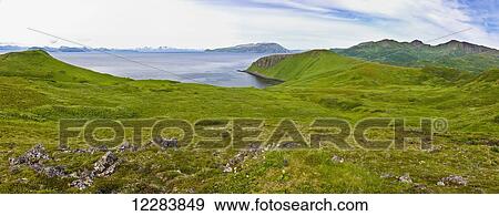 Scenic view of the green bluffs along the shore of Popof Island near Sand Point, Southwestern Alaska, USA, Summer View Large Photo Image Stock Photo - Scenic view of the green bluffs along the shore of Popof Island near Sand Point, Southwestern Alaska, USA, Summer. Fotosearch