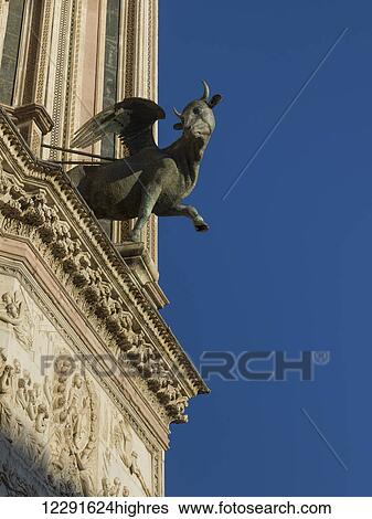 Sculpture of a winged animal on Orvieto Cathedral facade; Orvieto, Umbria, Italy View Large Photo Image Stock Photograph - Sculpture of a winged animal on Orvieto Cathedral facade; Orvieto, Umbria, Italy. Fotosearch