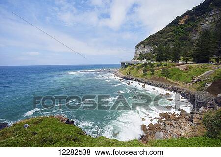 Sea cliff bridge, on the Grand Pacific Drive; New South Wales, Australia View Large Photo Image Stock Photo - Sea cliff bridge, on the Grand Pacific Drive; New South Wales, Australia. Fotosearch