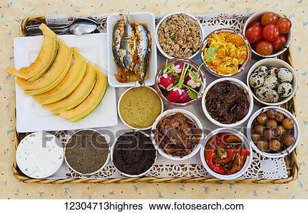 Stock Photograph - Selection of small dishes of Provencal entrees; Provence, France. Fotosearch