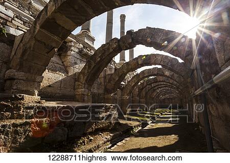 Stock Photograph - Site of ancient ruins with columns and arches; Smyrna, Turkey. Fotosearch