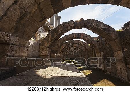 Stock Photograph - Site of ancient ruins with columns and arches; Smyrna, Turkey. Fotosearch
