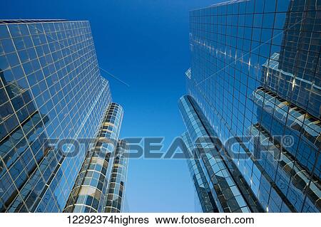 Stock Photograph - Sky Scrapers, Urban Buildings and Blue Sky. Fotosearch