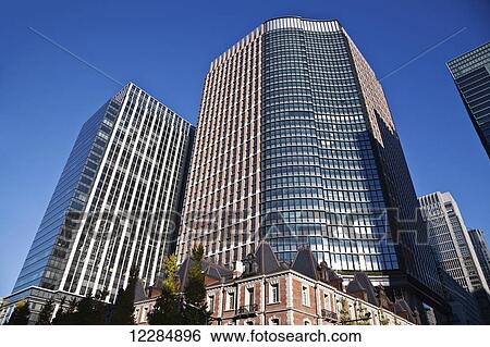 Stock Photograph - Skyscrapers against a blue sky; Tokyo, Japan. Fotosearch