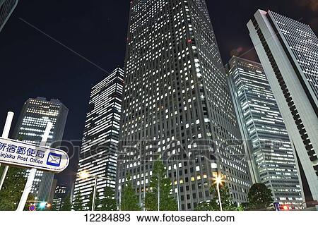 Skyscrapers illuminated at nighttime; Tokyo, Japan View Large Photo Image Stock Image - Skyscrapers illuminated at nighttime; Tokyo, Japan. Fotosearch