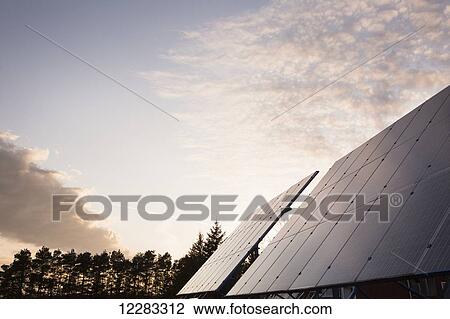 Solar panels in field; Bloomfield, Ontario, Canada View Large Photo Image Stock Image - Solar panels in field; Bloomfield, Ontario, Canada. Fotosearch
