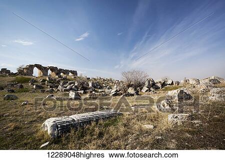 Stock Photograph - Some of the arches that were part of the gymnasium/bathhouse, located north of the stadium, dedicated to the emperor Hadrian and his wife Sabina around 124 AD; Laodicea, Turkey. Fotosearch