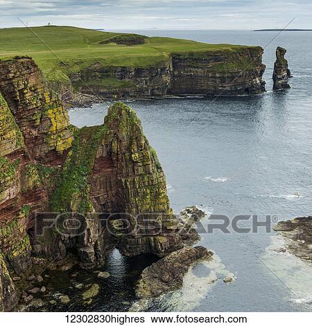 Stacks of Duncansby and the rugged coastline of Duncansby Head; Scotland View Large Photo Image Stock Photograph - Stacks of Duncansby and the rugged coastline of Duncansby Head; Scotland. Fotosearch
