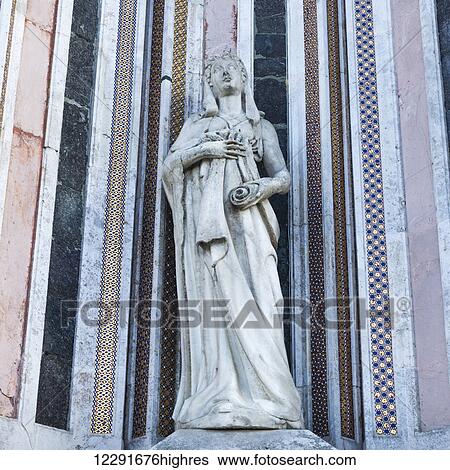 Stock Photograph - Statue of a woman; Orvieto, Umbria, Italy. Fotosearch