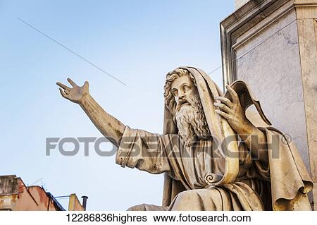 Statue of historical male figure holding a scroll and speaking; Rome, Italy View Large Photo Image Stock Photograph - Statue of historical male figure holding a scroll and speaking; Rome, Italy. Fotosearch