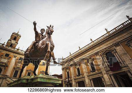 Stock Photograph - Statue of horse and rider; Rome, Italy. Fotosearch