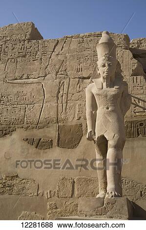 Statue of Pharaoh in Peristyle Court, Karnak Temple Complex; Luxor, Egypt View Large Photo Image Stock Photo - Statue of Pharaoh in Peristyle Court, Karnak Temple Complex; Luxor, Egypt. Fotosearch