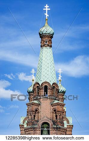 Stock Photograph - Steeple and cross of Orthodox church; Tampere, Finland. Fotosearch