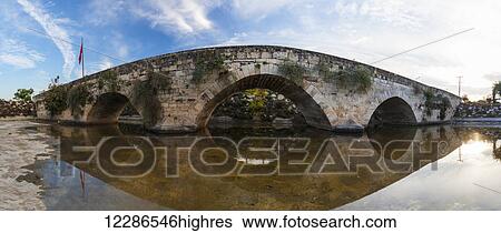 Stone bridge at the entrance to Tarsus on the Ankara-Adana road; Tarsus, Turkey View Large Photo Image Stock Photograph - Stone bridge at the entrance to Tarsus on the Ankara-Adana road; Tarsus, Turkey. Fotosearch