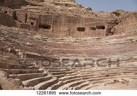 Stock Photography - Stone steps and rectangular openings carved in stone; Petra, Jordan. Fotosearch