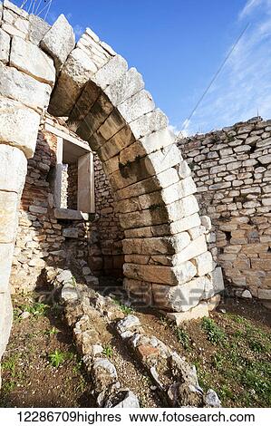 Stock Photograph - Stone wall and arch at the amphitheatre; Philippi, Greece. Fotosearch