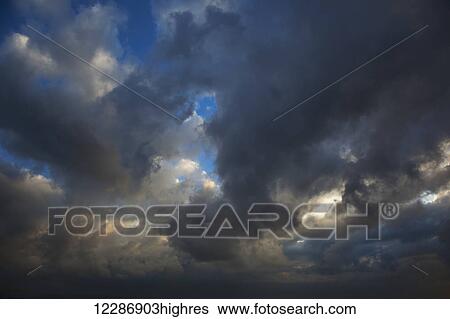 Stock Photograph - Storm clouds forming; Israel. Fotosearch